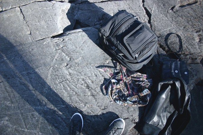 Susanna taking photos of her diy´s by the shore