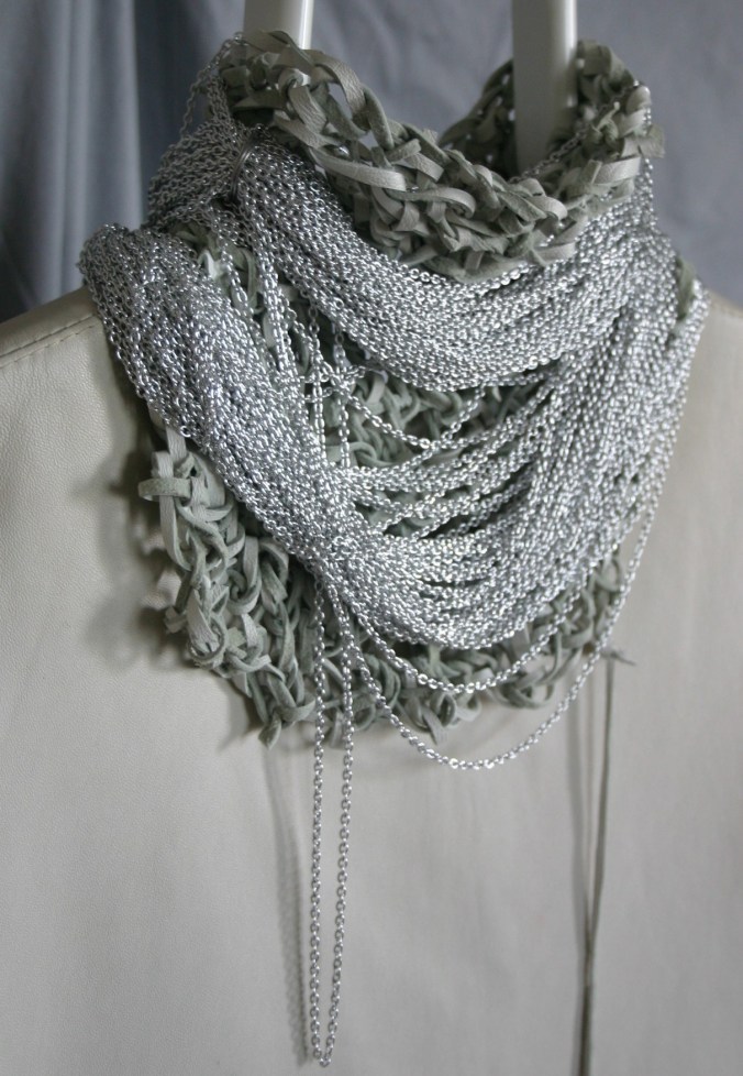 diy crocheted white leather and silver colored chain neckpiece