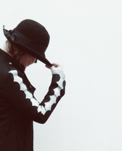 Susanna wearing her diy woolen jacket with woolen vintage hat