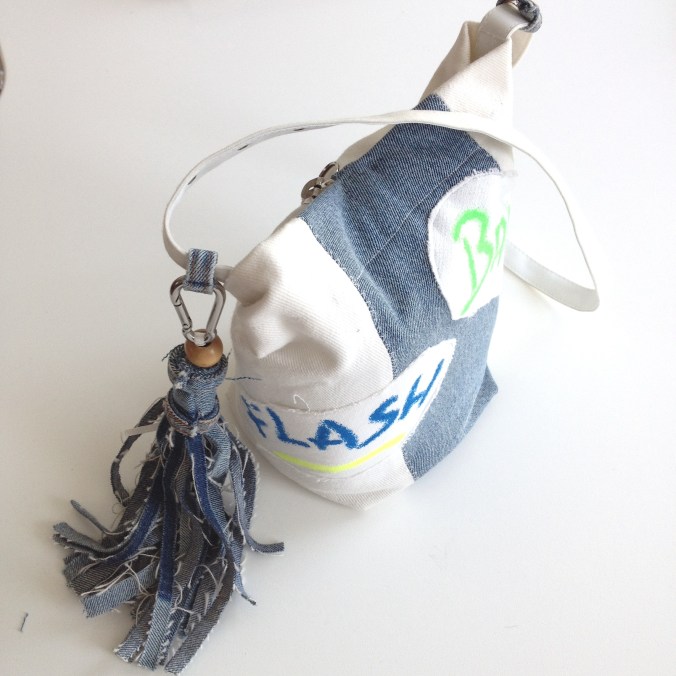 diy camera bag out of 90`s print fabric and denim tassel