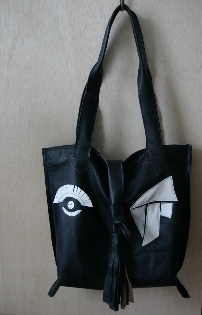 diy leather bag made out of old leather jacket, decorations white leather inspired by abstract art.