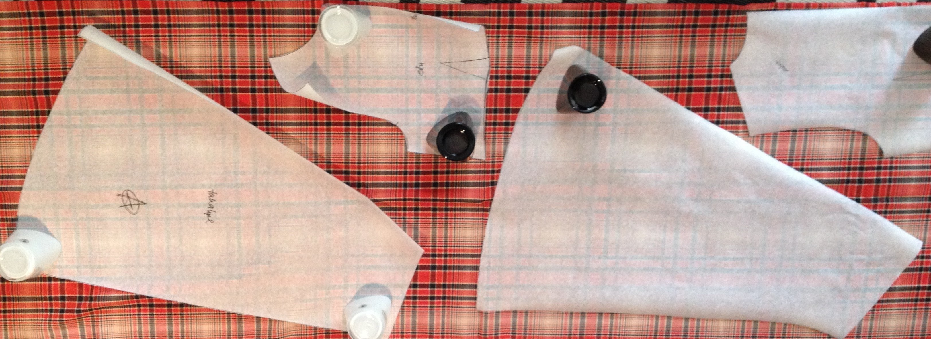 laying dress patterns on checkered fabric