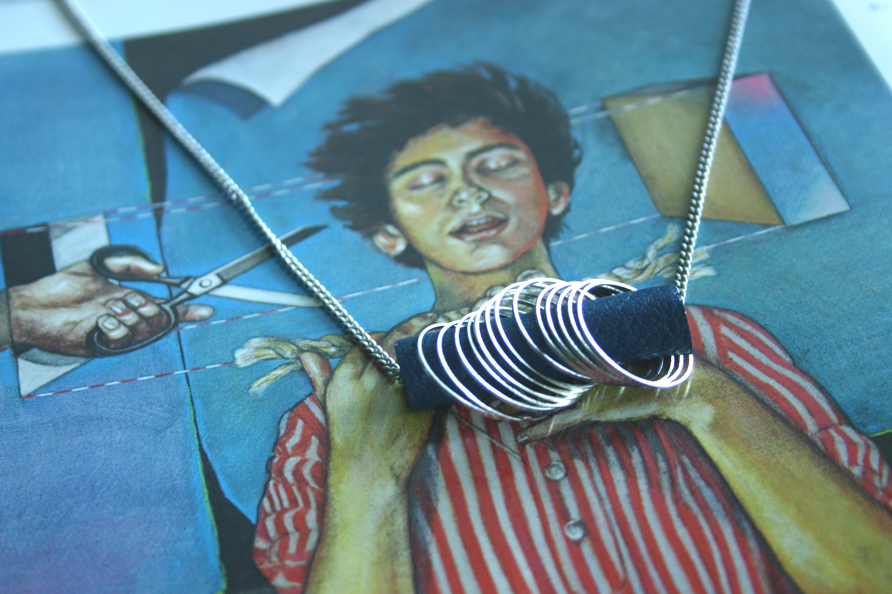 diy leather pendant with second hand silver colored rings