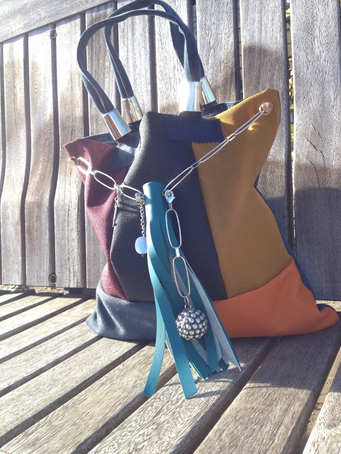 diy bag from fabric sofa samples with recycled jewellery and parts from old bags