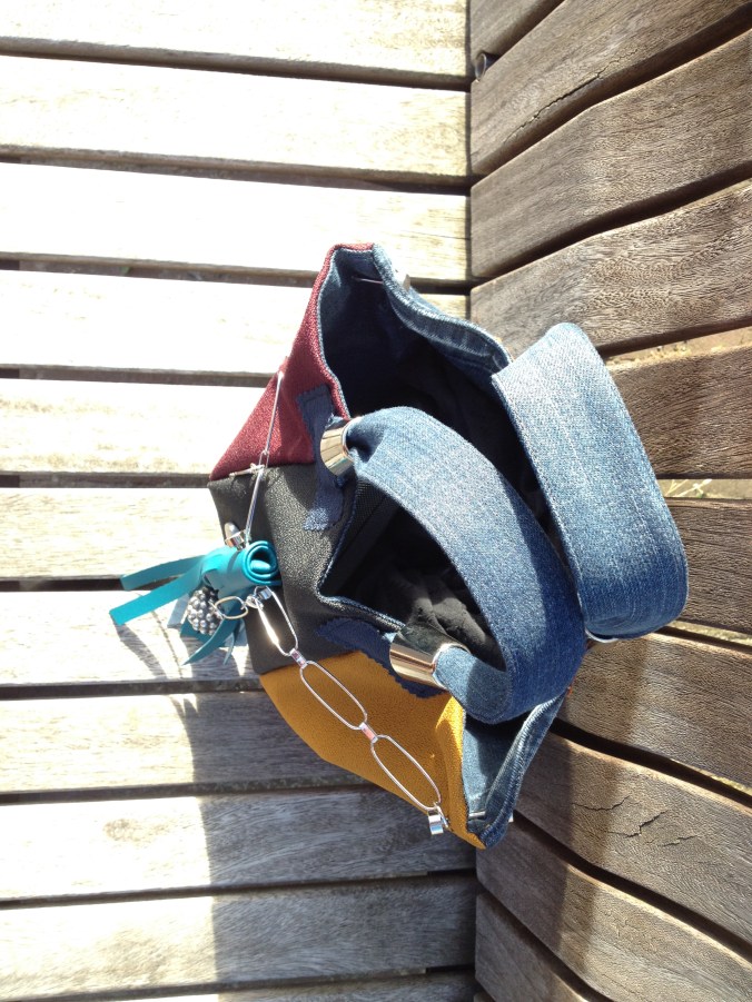 diy bag from fabric sofa samples with recycled jewellery and parts from old bags