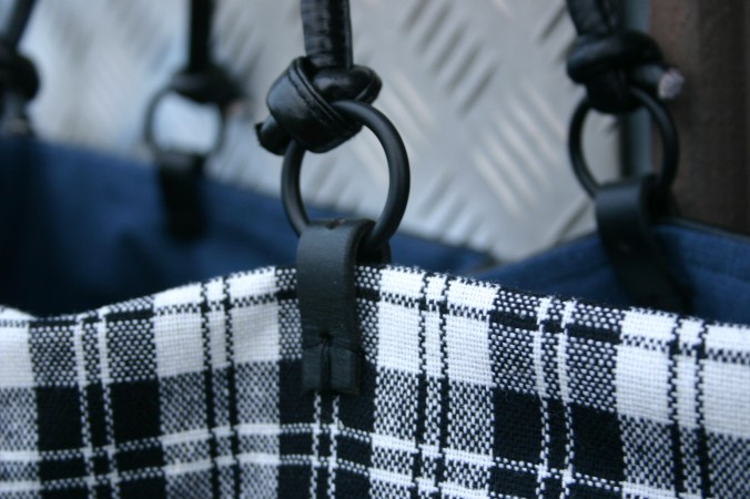 handles from old bag, leather parts to hold handle old belt